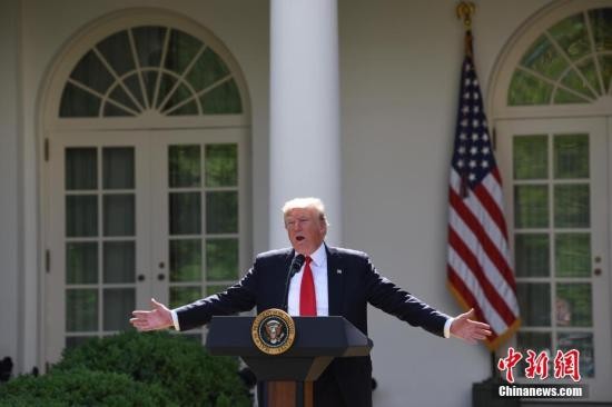 当地时间6月1日,美国总统特朗普在白宫宣布,美国将退出《巴黎协定》。他同时强调,美国也许会重返有关应对气候变化的协定,但前提条件是协定必须要对美国更加“公平”。 <a target='_blank' data-cke-saved-href='http://www.chinanews.com/' href='http://www.chinanews.com/'><p align=